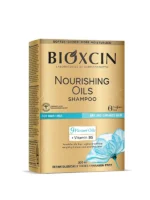 شامپو مرطوب کننده مو مخصوص موهای خشک و آسیب دیده بیوکسین  Bioxcin Nourishing Oils Shampoo